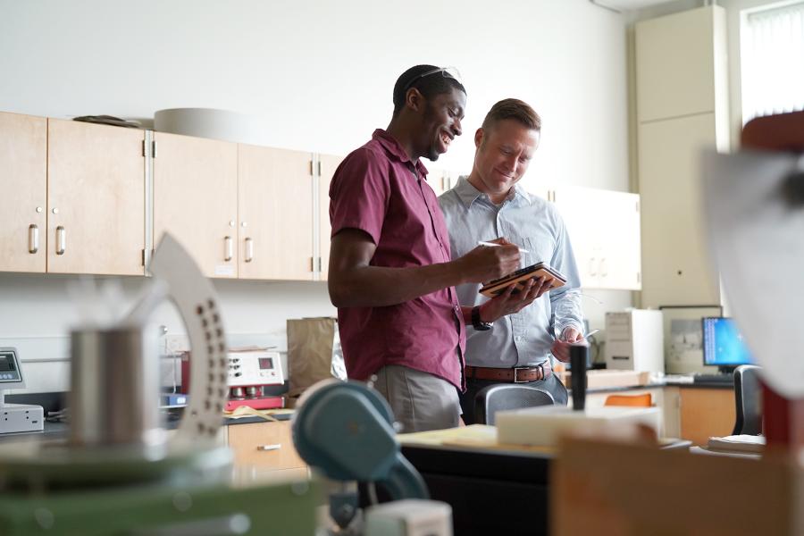 Student with mentor, preparing for a career.