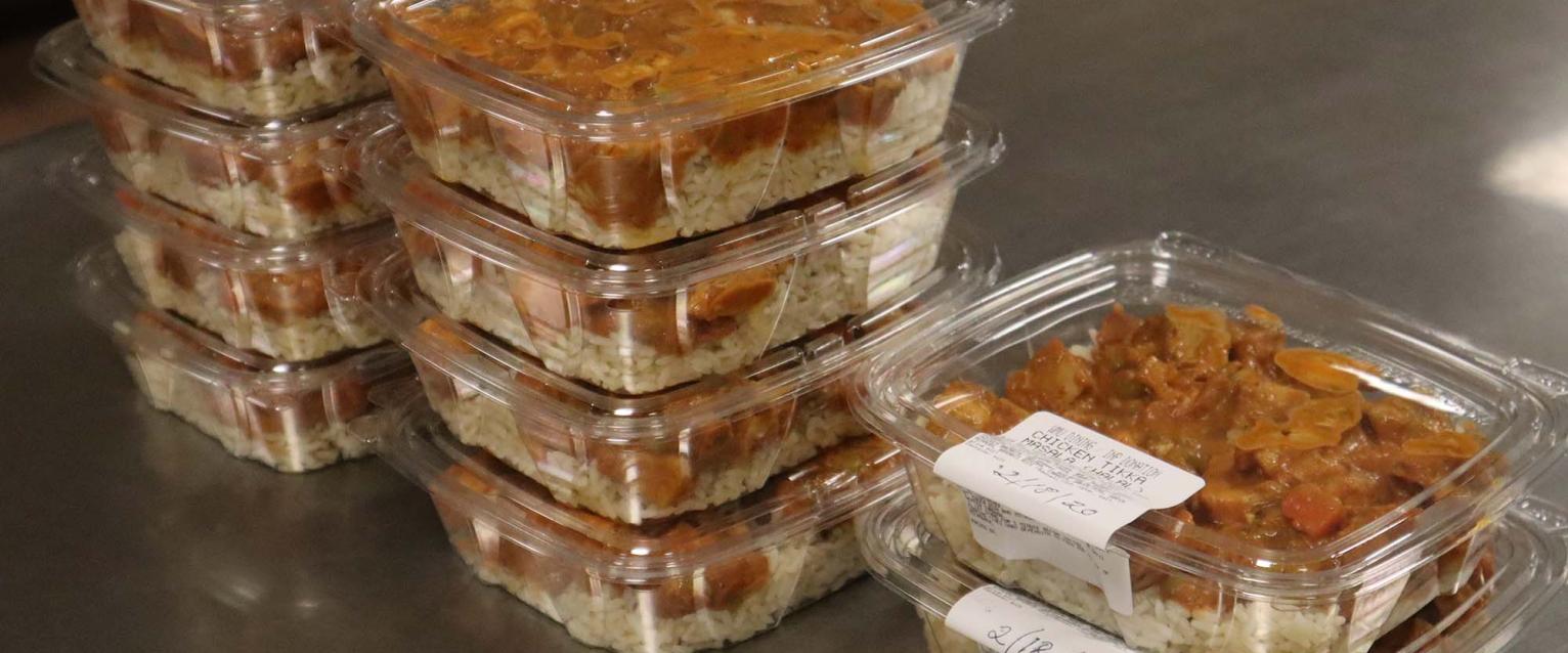 Food, meal prep for Invisible Needs Project, photo of meal containers.